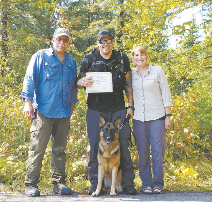7-1 Mike Sanchez, with son and wife.jpg